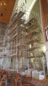 The Making of Holy Trinity Church featuring safety scaffolding measures